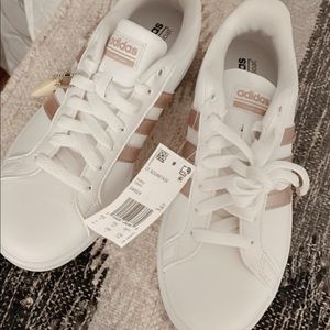 New and Unworn Adidas Original Rose Gold Size 7